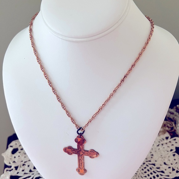 unbranded Jewelry - Necklace features a stunning copper cross pendant 24”